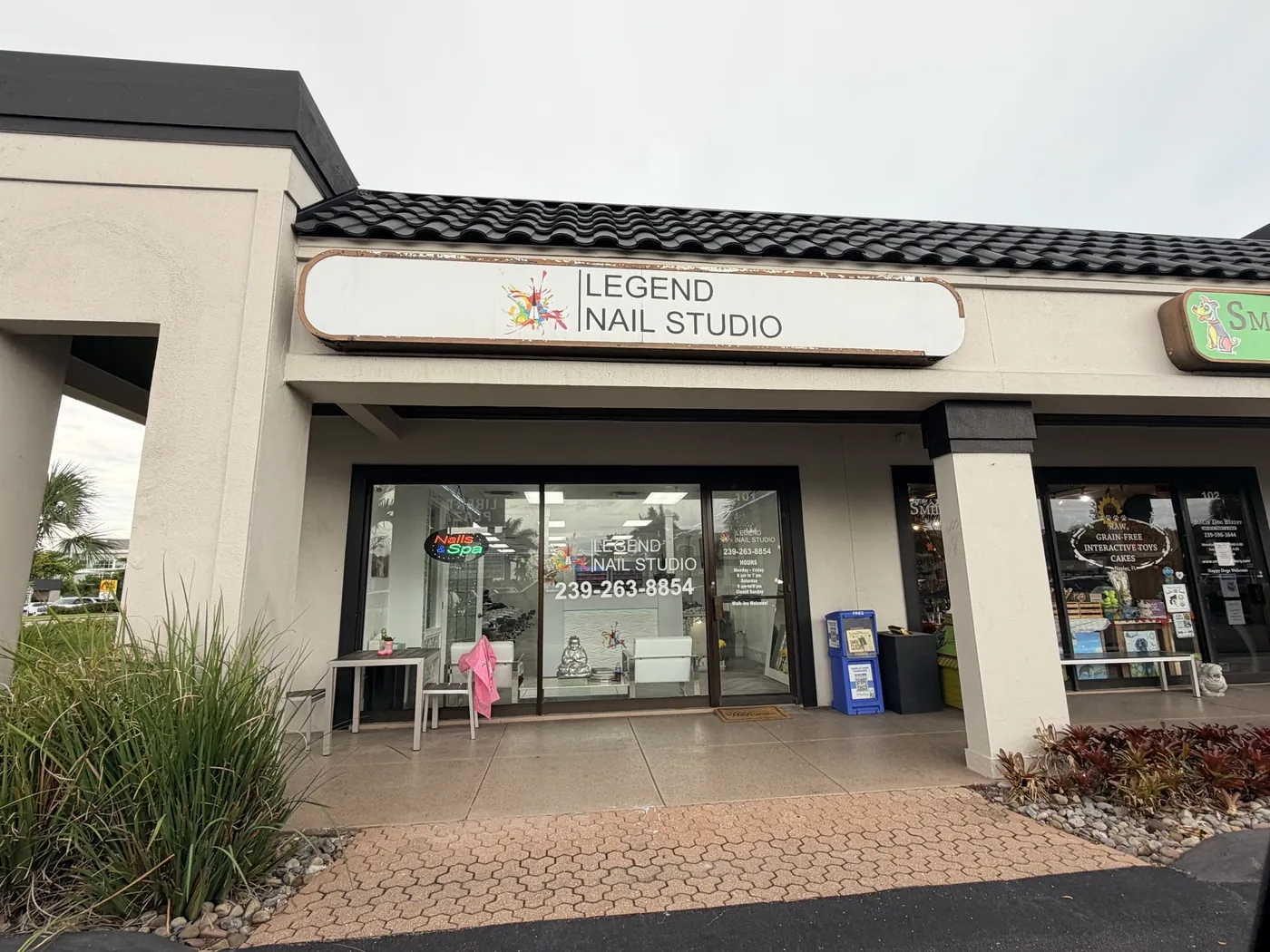 The Legend Nail Studio storefront on Tamiami Trail North, with its sign above the entrance